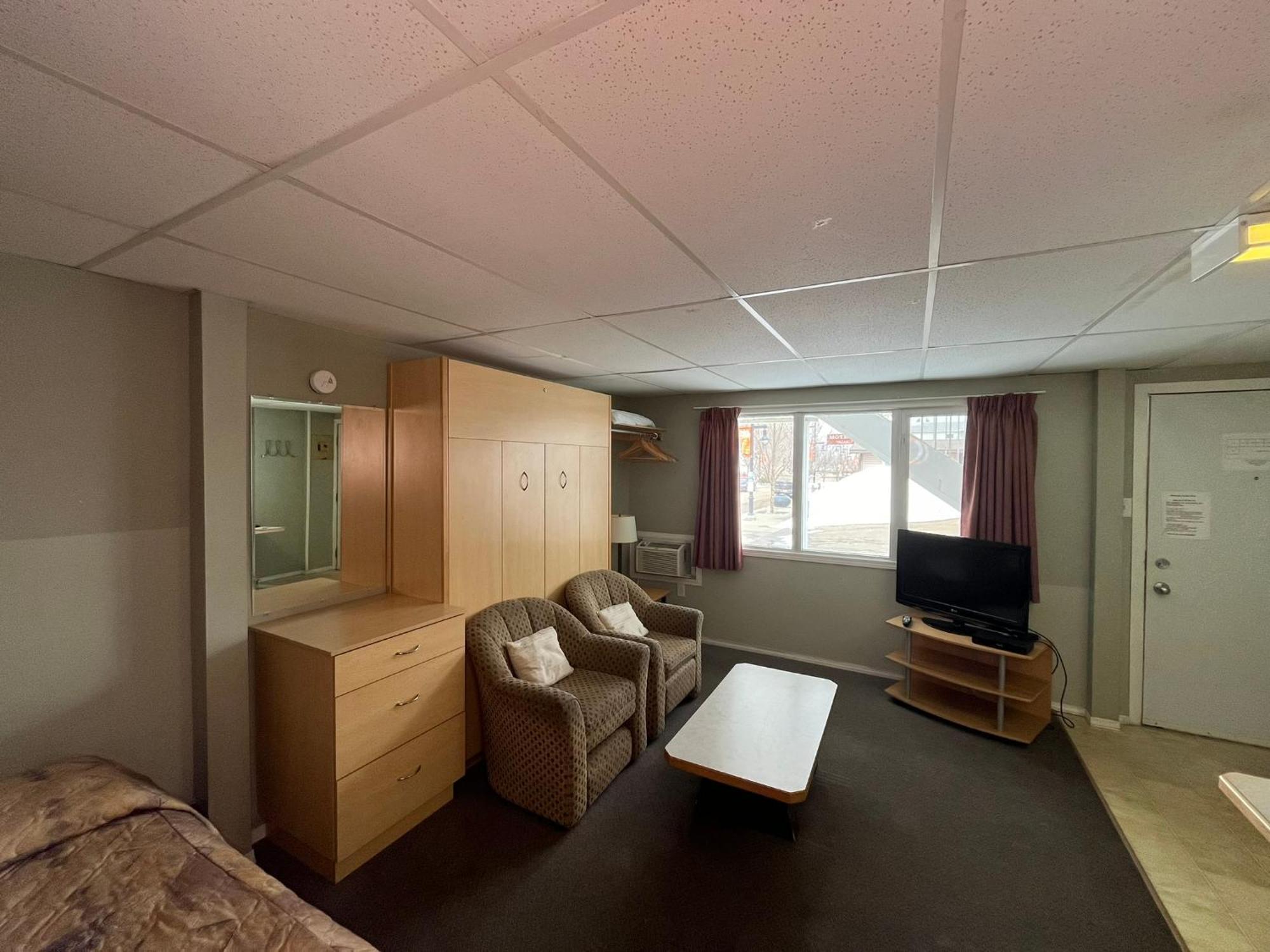 Raccoon Lodge Motel Sylvan Lake Δωμάτιο φωτογραφία